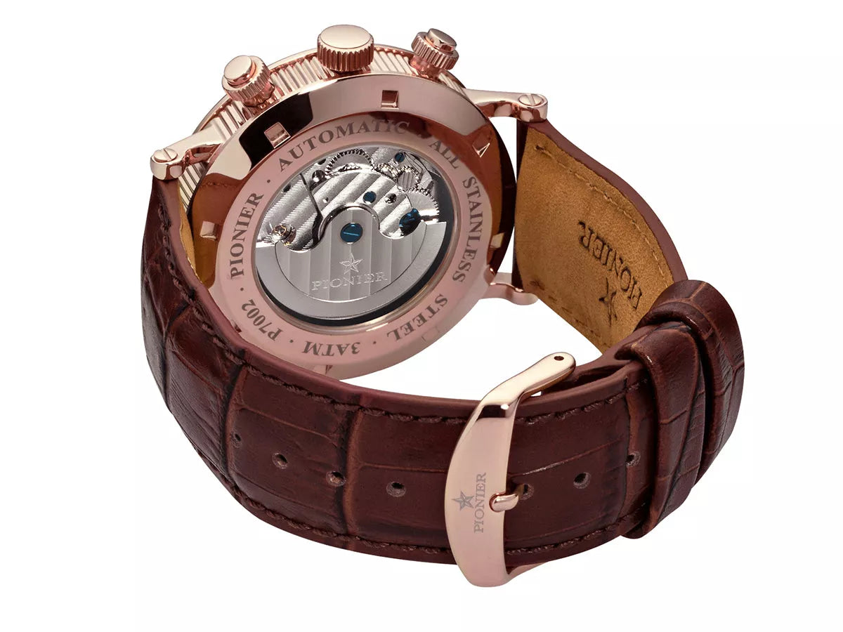 Open back case with silver color movement and standard buckle for the brown leather band.