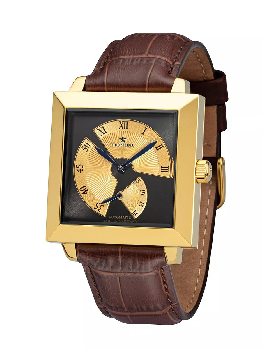 Black and gold dial with brown leather band and gold case.