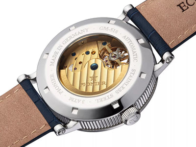 Open back silver case with gold color movement 